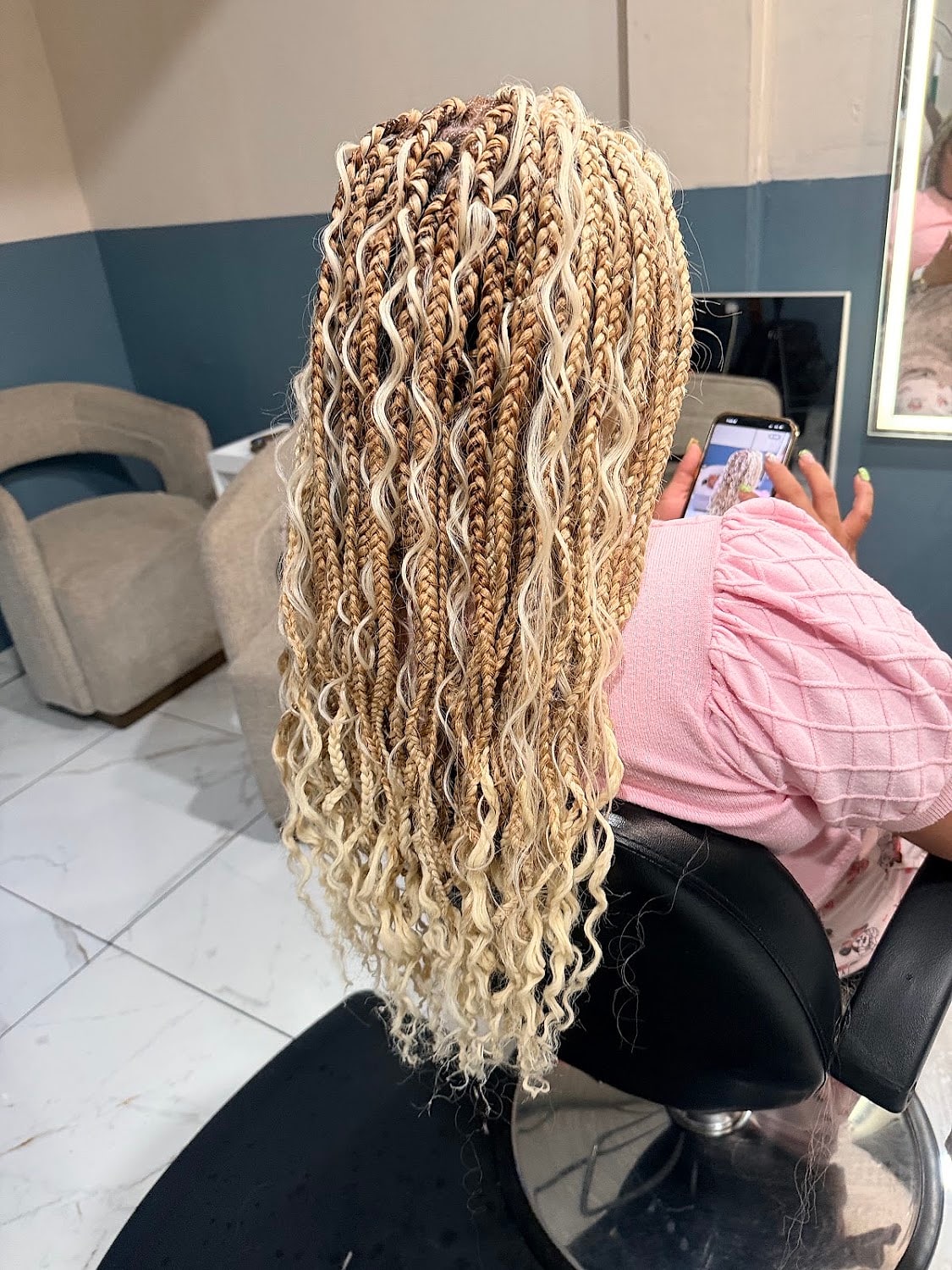 Blonde boho braids with curled ends, braided in Highland
