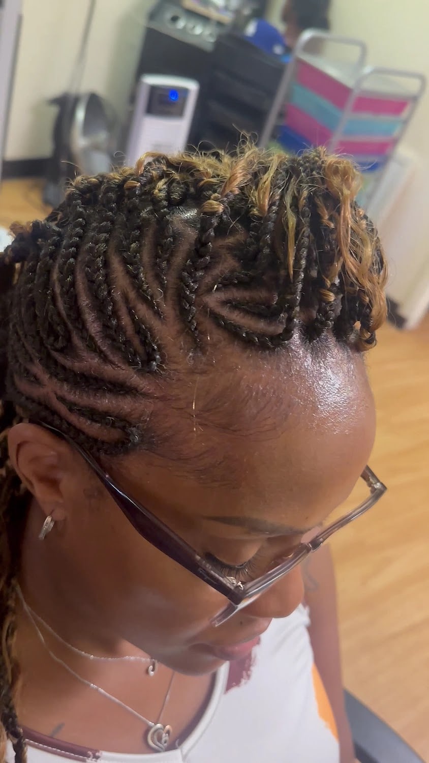 Fine cornrows braided straight back